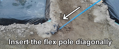 Insert the flex pole diagonally